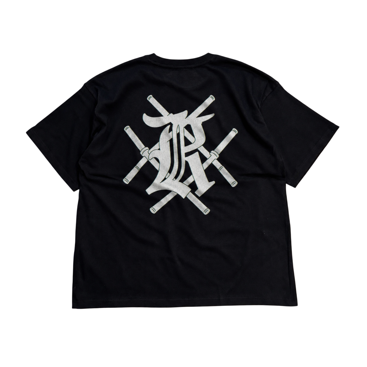 Back view of a black t shirt with white design of bars crossing and the letter K 