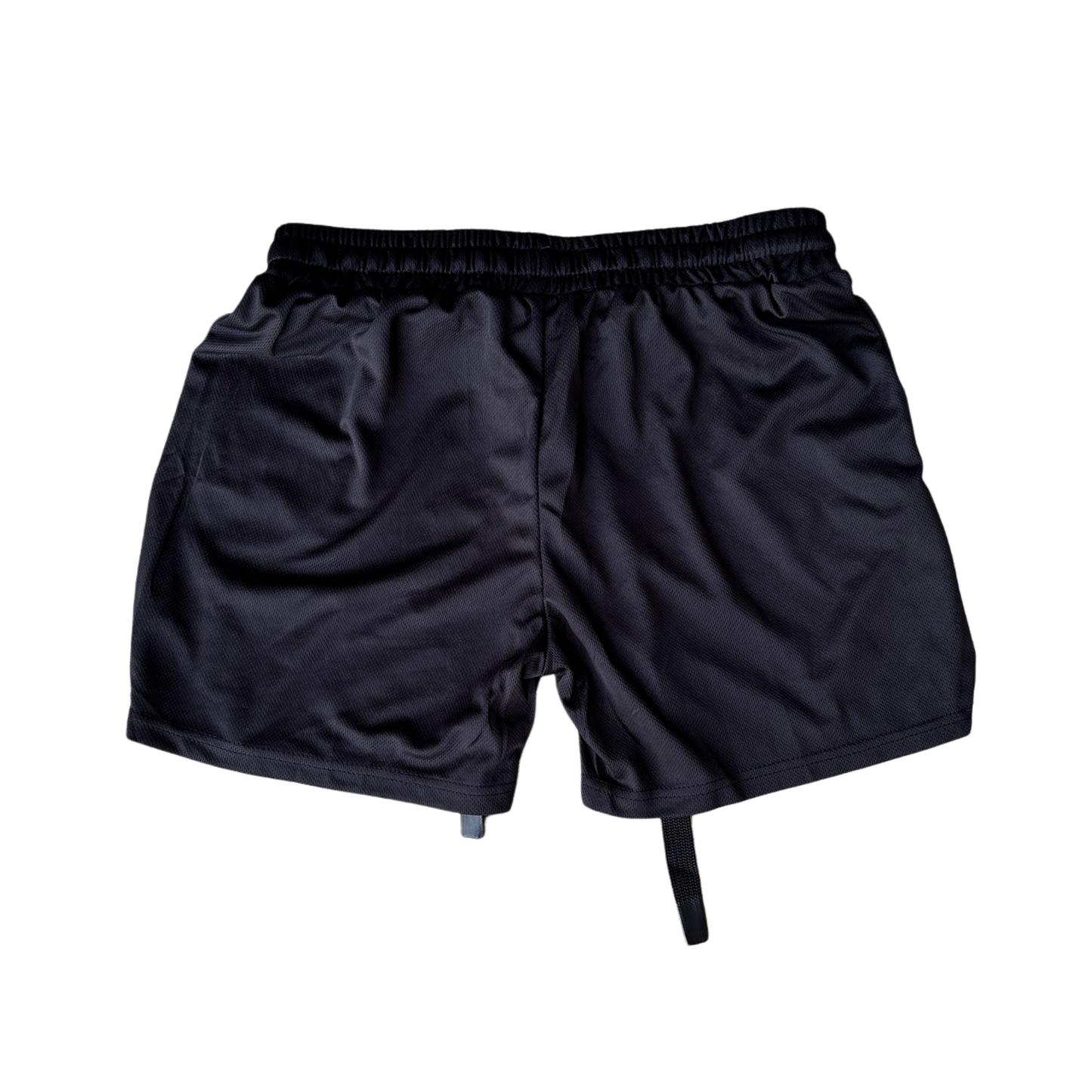 Back view of plain black athletic shorts with elastic waistband and black drawstrings 