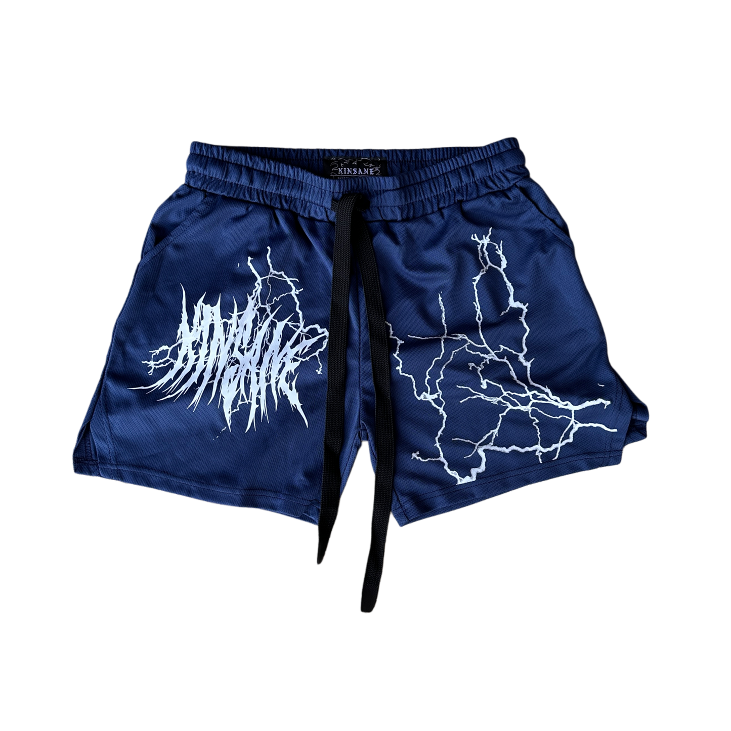 Navy blue athletic shorts with elastic waistband and black drawstrings and lightning designs on each leg with white tribal lettering reading “KINSANE” on the right leg 