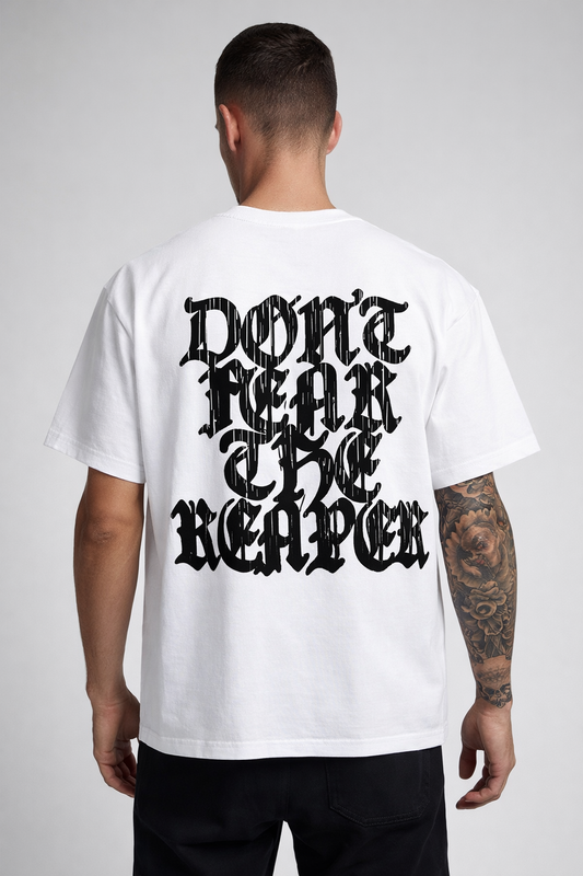 Back view of man wearing a white t shirt with black lettering reading “DON’T FEAR THE REAPER” 