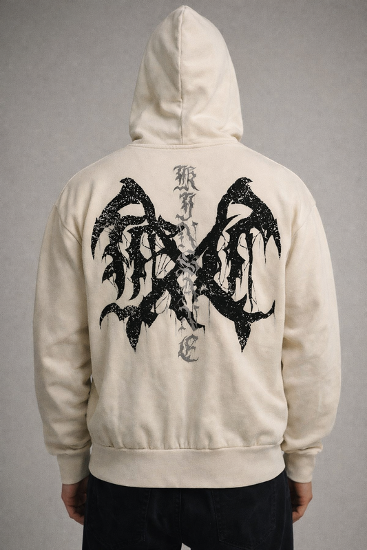 Back view of a man wearing a tan hoodie with black logo and silver lettering reading “KINSANE” 