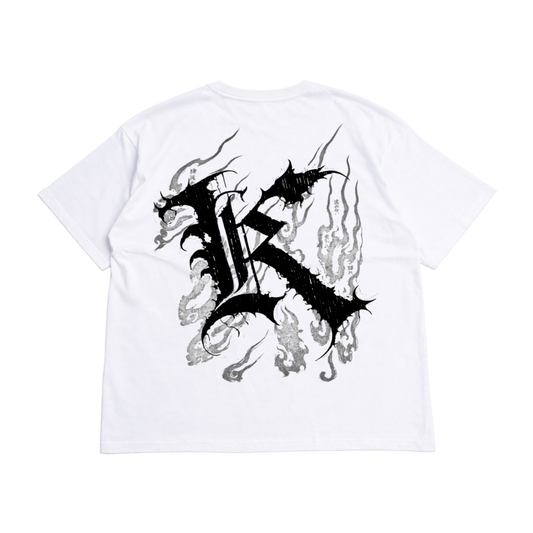Back view of a white T-shirt with a black logo displaying black Japanese style flames and a black letter “K” and various Japanese text and black text reading “ROCK BOTTOM IS OUR RESURRECTION. TRAIN INSANE” 