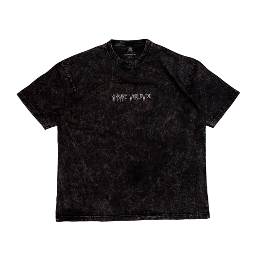 Black acid washed t-shirt with white lettering on the front reading “KINSANE WORLDWIDE” 
