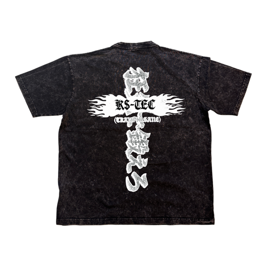 Back view of a black acid washed t shirt with white logo on the back with white flames and black lettering reading “KS-TEC” and “(TRAIN INSANE)” and white Japanese lettering translating to “TRAIN INSANE” 