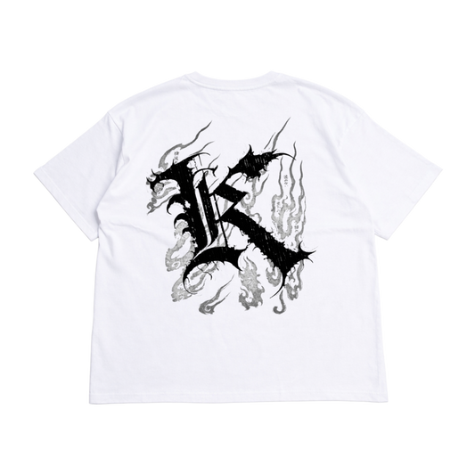 Back view of a white T-shirt with a black logo displaying black Japanese style flames and a black letter “K” and various Japanese text and black text reading “ROCK BOTTOM IS OUR RESURRECTION. TRAIN INSANE” 
