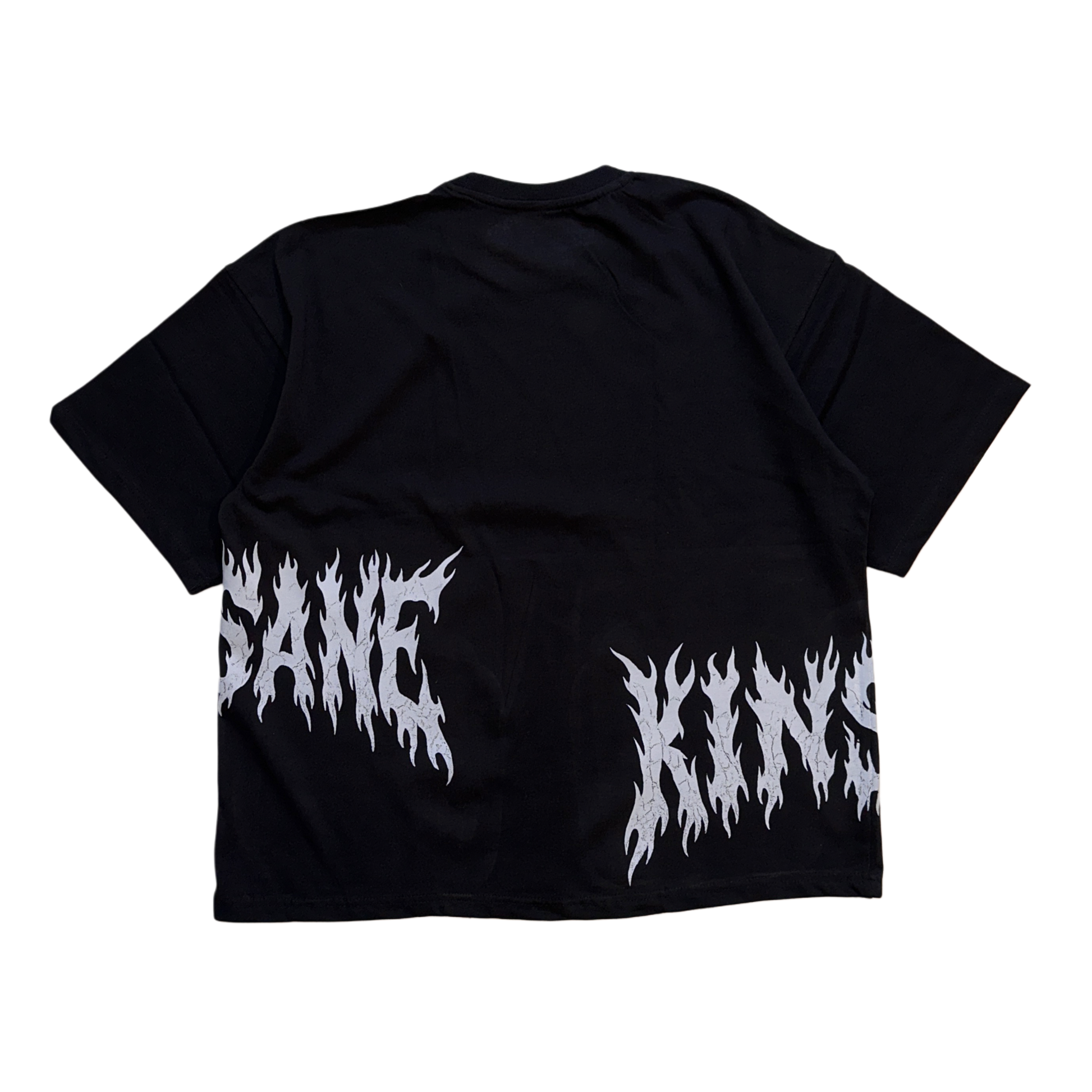 Back view of a Black T-shirt with white flamed lettering on the sides reading “KIN” and “SANE” 