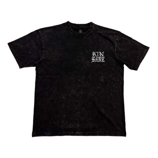 Black acid washed t shirt with white lettering reading “KINSANE” 