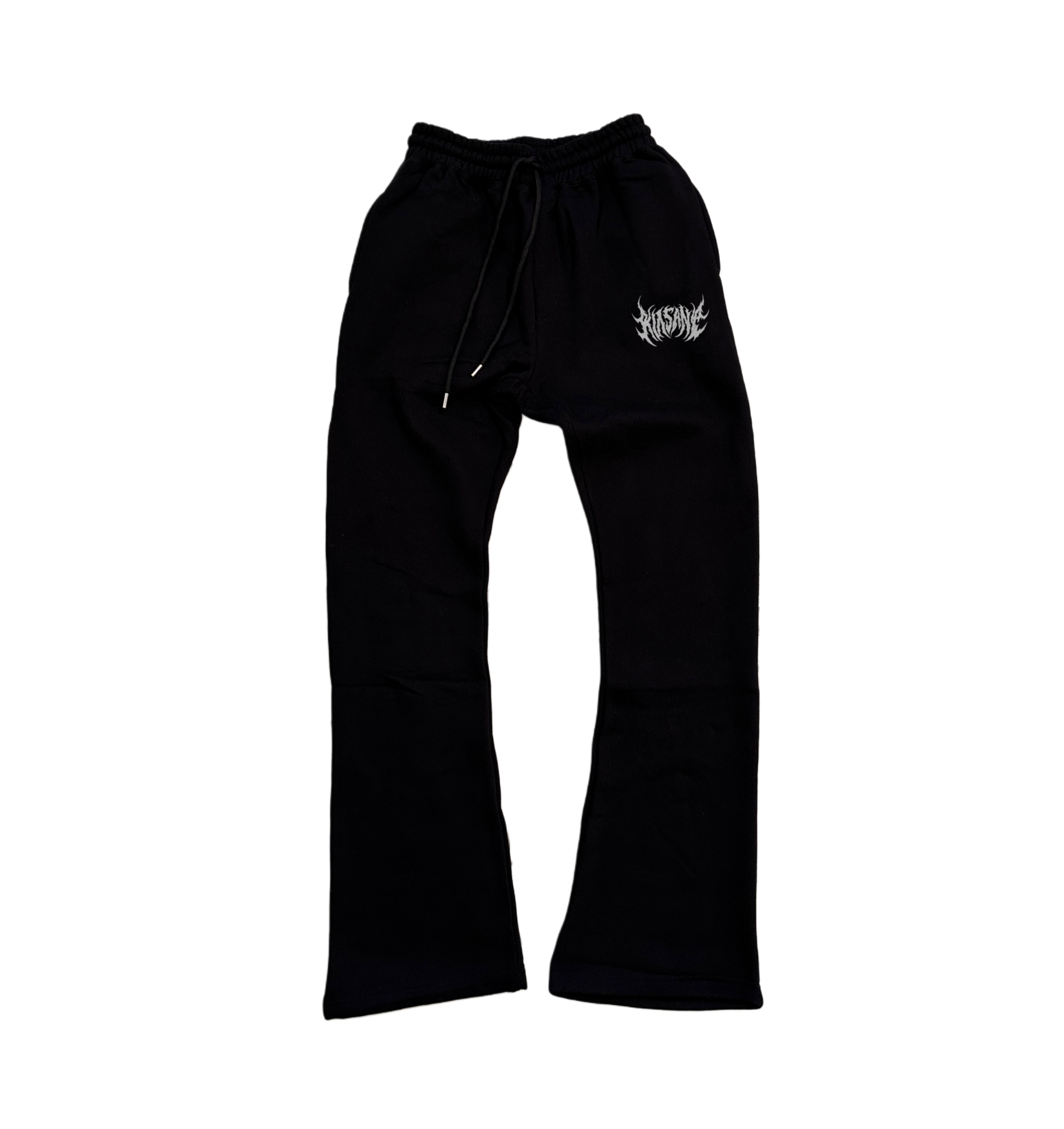 Black stacked sweatpants with white lettering reading “KINSANE” on the left leg 