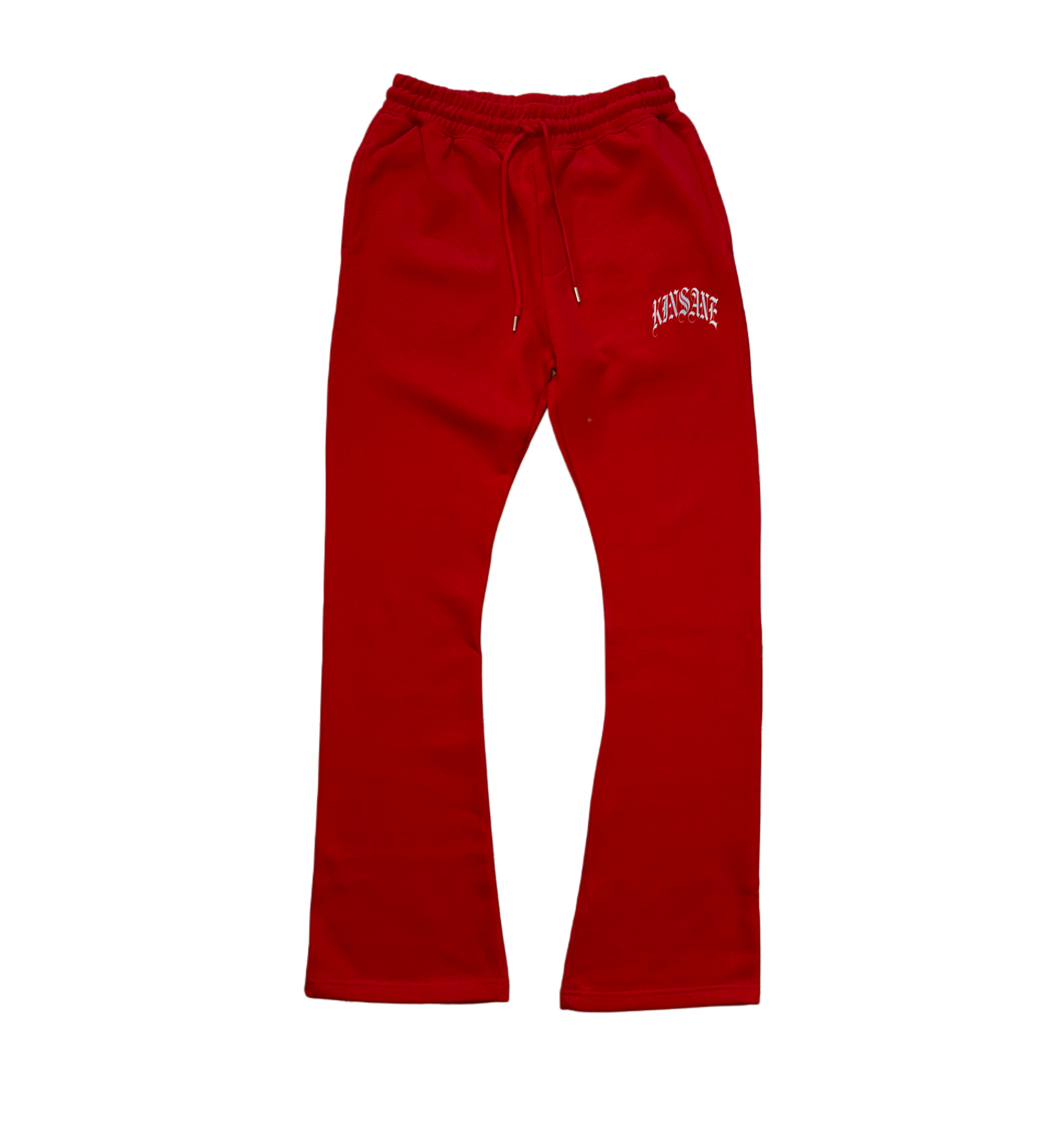 Red stacked sweatpants with white lettering reading “KINSANE” on the right side 